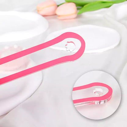 Pink acrylic paddle handle detail view