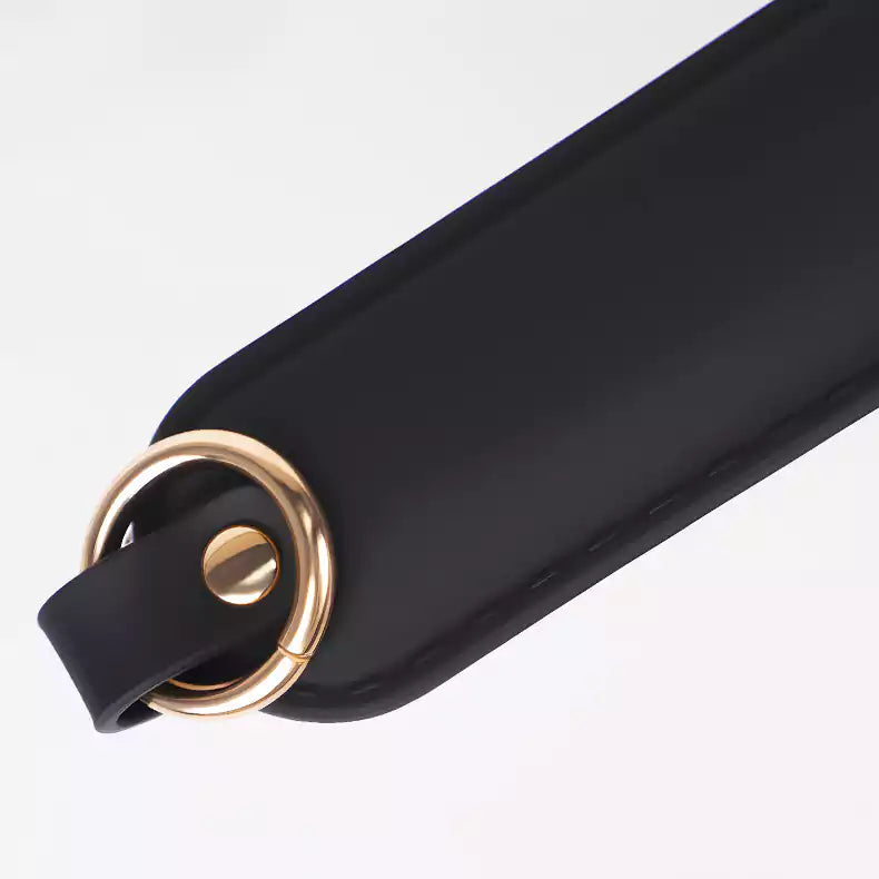 Wrist strap detail on silicone cat paw paddle