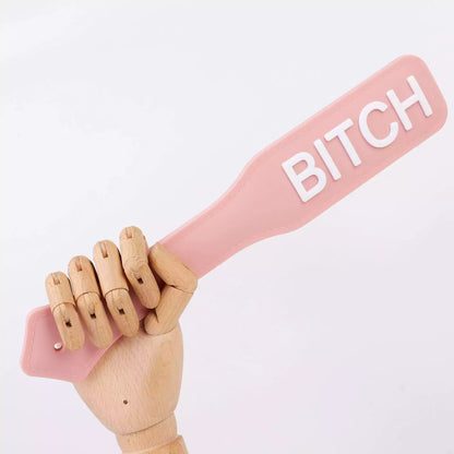 pink BITCH silicone paddle lifestyle scene